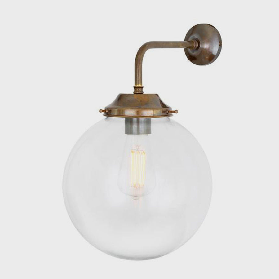 Globe Wall Light | Shoppe Amber Interiors added by Elizabeth Roussil
