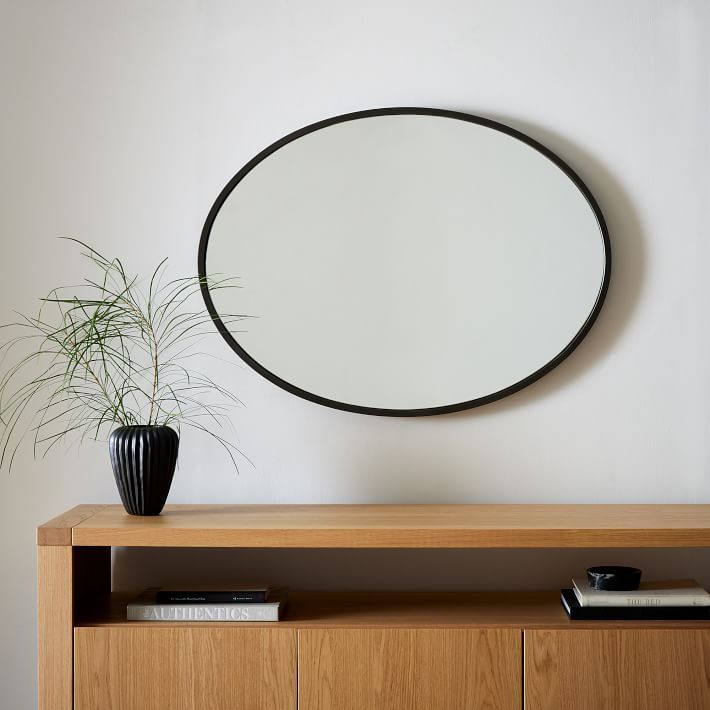 Metal Frame Oval Wall Mirror added by Spoak Member