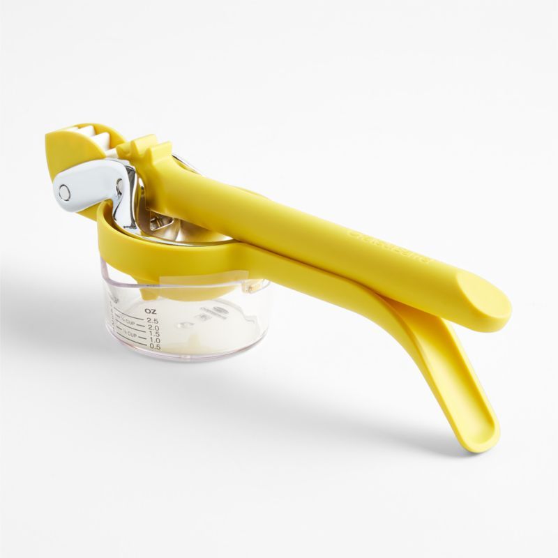 Crate & Barrel Citrus Squeezer with Measuring Cup added by Spoak Member