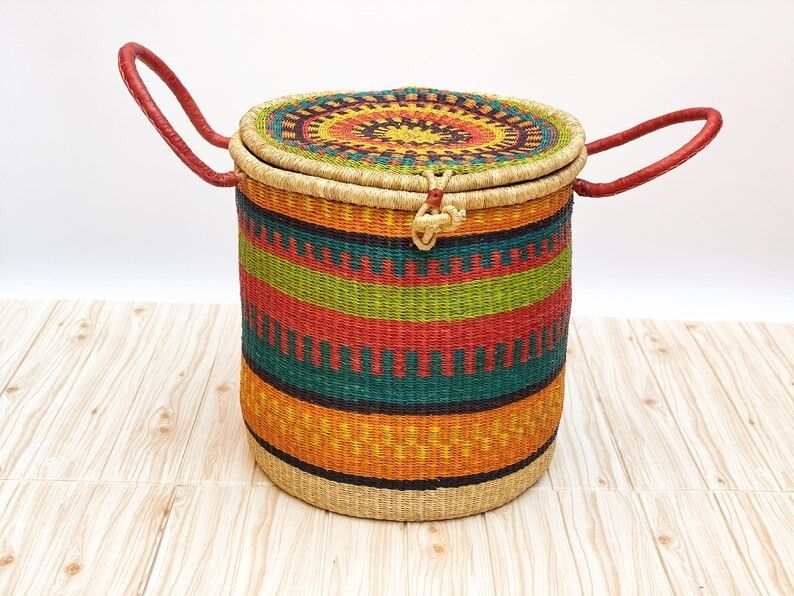 African woven laundry basket with lid added by Hannah Aho