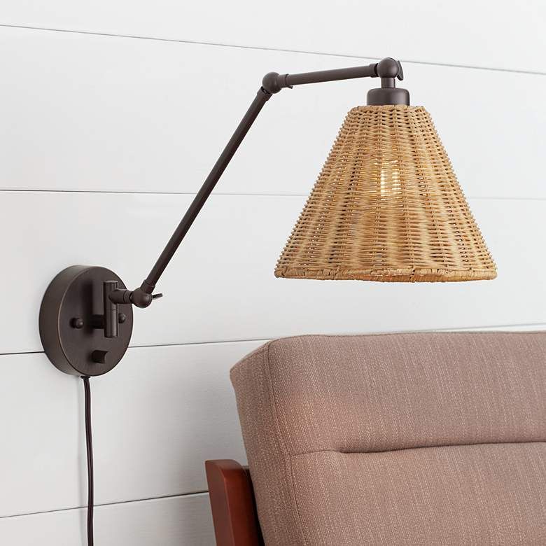 Rowlett Bronze Rattan Shade Plug-In Wall Lamp added by Lauren Chunias