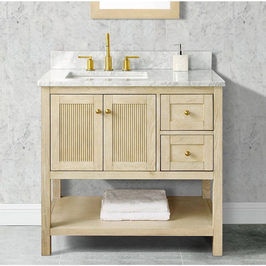 Home Decorators Collection Arcott 37 in W x 22 in D x 35 in H Single Sink Fluted Bath Vanity in Natural Wood With Carrara Marble Top TH1049 - The Home Depot added by Brooke Hartman