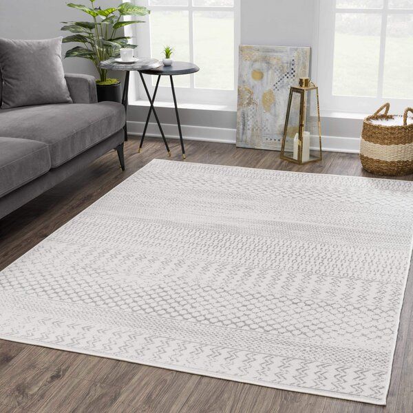 Dounia Southwestern Area Rug in Gray added by Caroline Niederst