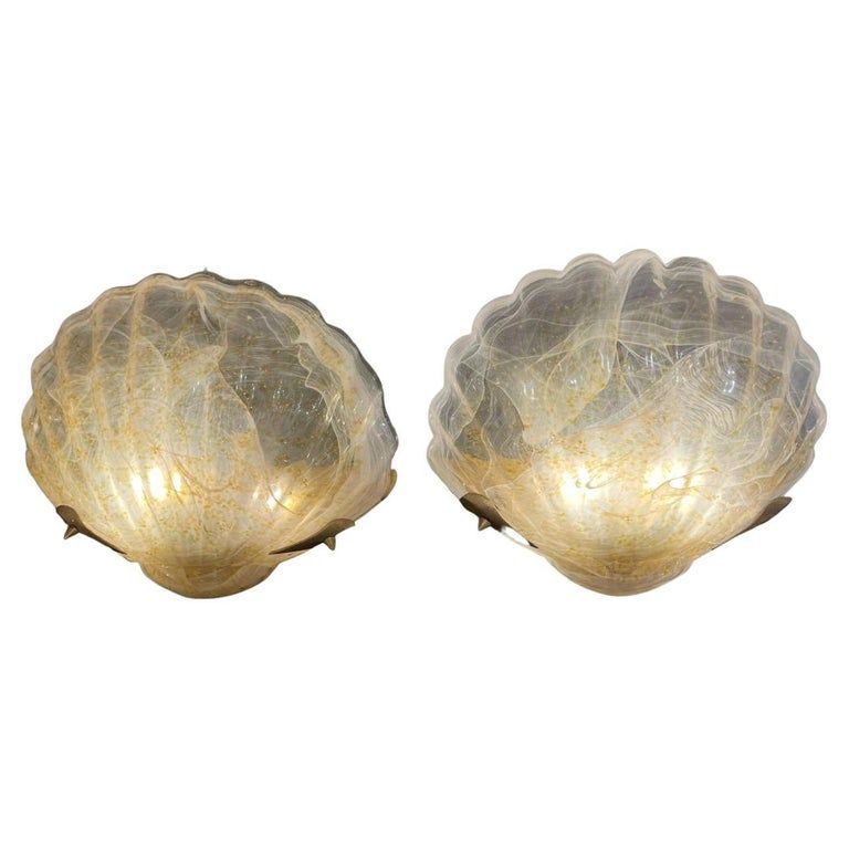 1960s Italian "Shell" Wall Lights in White and Amber Murano Glass added by Chanel Jezek
