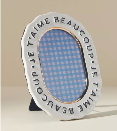 Claudette Frame in White w/ Black Text added by Caitlin Ackerman