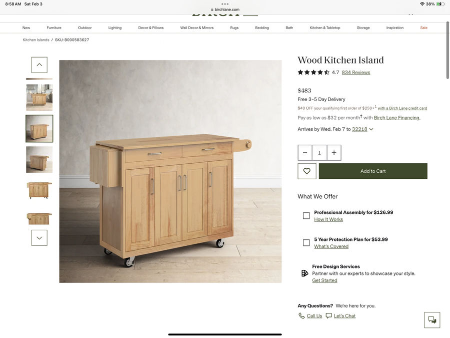Wood kitchen island added by Laura Hernandez