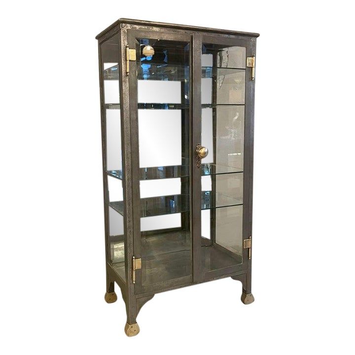 Late 19th Century Antique Industrial Brushed Steel Double Door Apothecary Display Cabinet added by Alyssa Hennessey