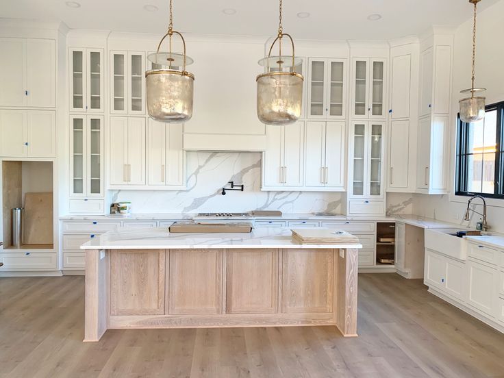 Custom cabinets with white oak island | White oak kitchen, Home kitchens, Farmhouse kitchen design added by Maggie Griesbeck