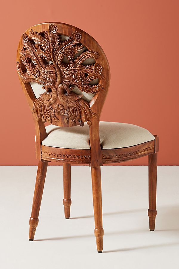 Handcarved Peacock Dining Chair added by Jourdan Reinhart