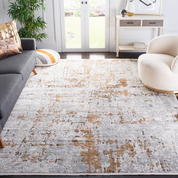Broadway Abstract Gray/Gold Area Rug added by Spoak Member