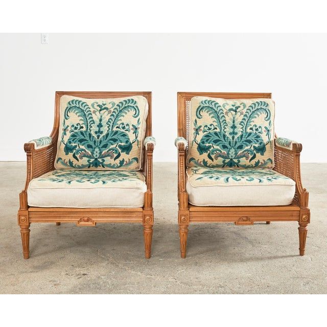 Pair of Louis XVI Style Walnut Caned Needlepoint Lounge Chairs added by Bridget Nelson