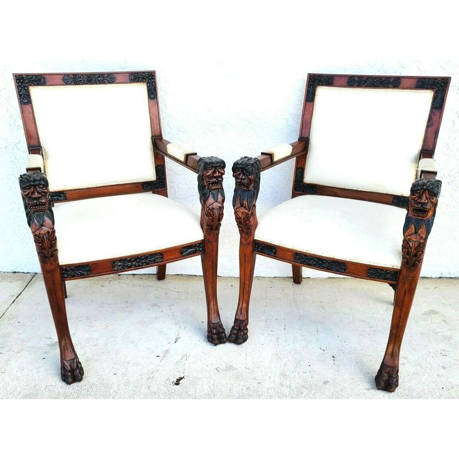 Hand Carved Mahogany Lions Head Armchairs - Set of 2 added by Florence Duah