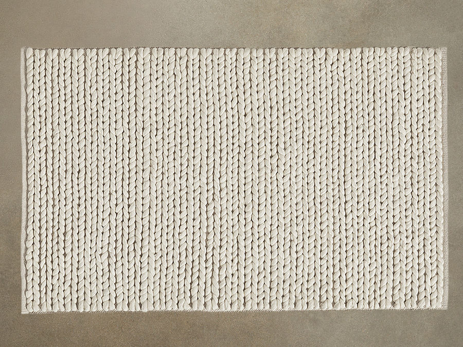 Braided wool rug added by Jennifer Tormo