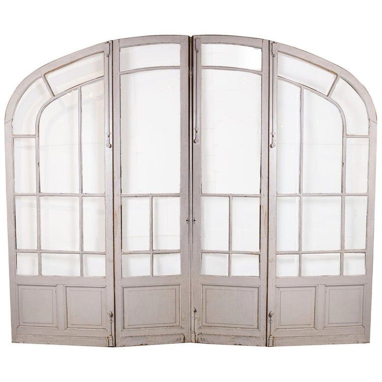 Pair of Grand-Scale Arched Glass-Paneled Double Doors added by Briona Petrous