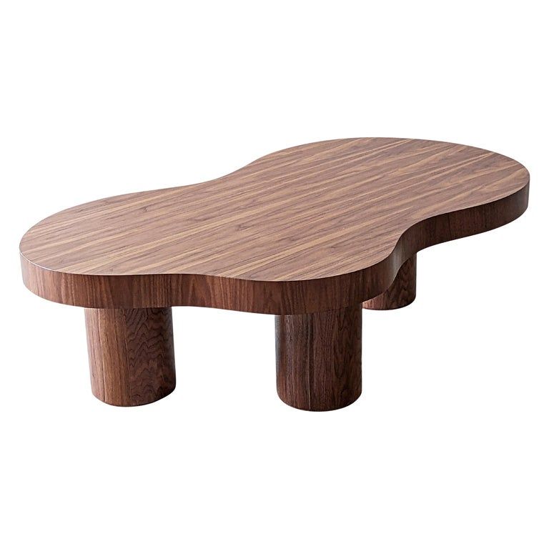 Amoeba Walnut Coffee Table added by Madelynn Furlong