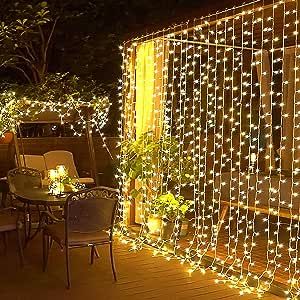JMEXSUSS 300 LED Remote Control Curtain Lights, Plug in Fairy Curtain Lights Outdoor, Window Wall Hanging Curtain String Light for Bedroom Backdrop Wedding Party Garden Indoor Decoration (Warm White) added by Ashley Genard