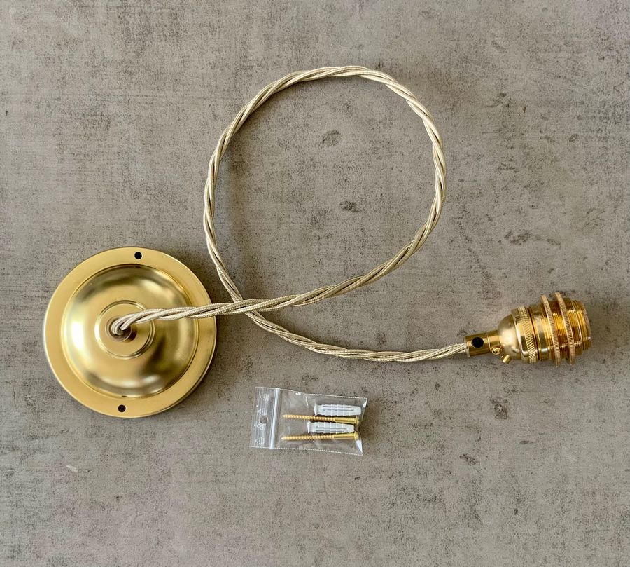 E26 base ceiling pendant kit in solid raw brass for 120V, 11.5cm diameter raw brass canopy. UL listed lampholder, and UL recognised cord. added by Sara Charlesworth