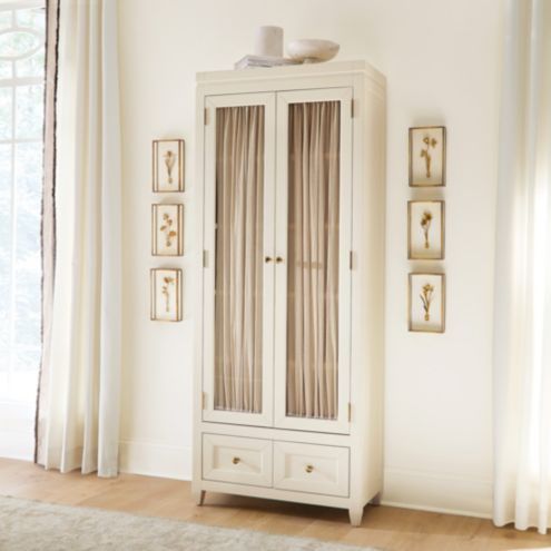 Nora Storage Cabinet Tall White with Glass Doors & Curtains added by Chelsea Dickson