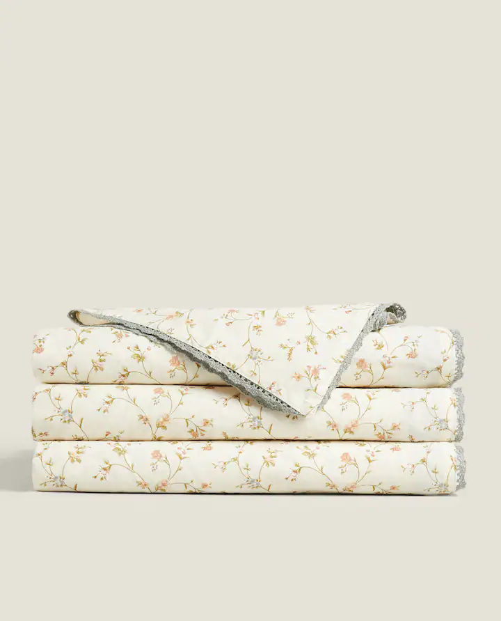 floral tablecloth added by Elizabeth Roussil