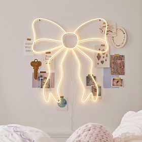 LoveShackFancy Bow Neon Wall Sign added by Caitlin Ackerman