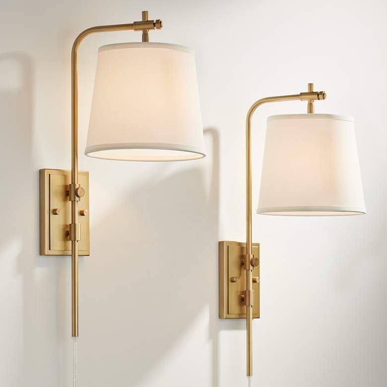 Barnes and Ivy Seline Warm Gold Adjustable Plug-In Wall Lamps Set of 2 added by Erin Vernon