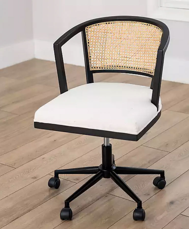 black woven cane chair added by Madison Subry