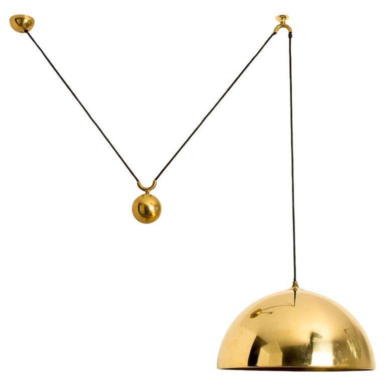 Single Pull Brass Pendant Light by Florian Schulz added by Rim Berradi