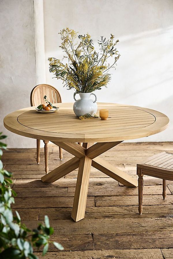 Cross Leg Teak Round Dining Table added by Jane Greenstein