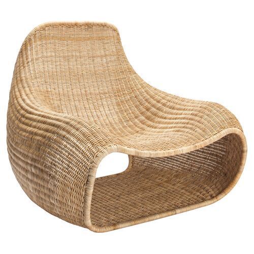 cozy rattan chair added by taided betancourt
