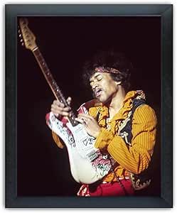 Globe Photos Jimi Hendrix Playing with Pick in Mouth, 16"x20" Framed Photo 18"x22" Framed Photo added by Jay C. Lynn Interior Designs, LLC