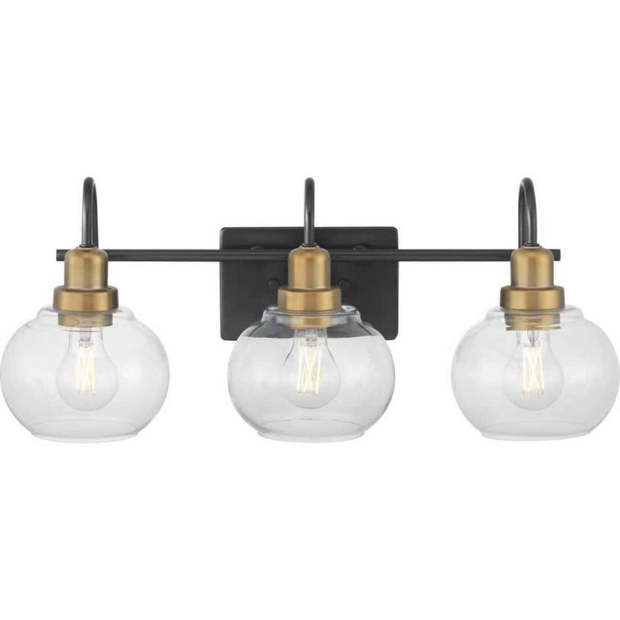 Home Decorators Collection Halyn 23 in. 3-Light Matte Black with Vintage Brass Bathroom Vanity Light Accents and Clear Glass Shades 1019HDCMBVBDI - The Home Depot added by Stephanie Enholm