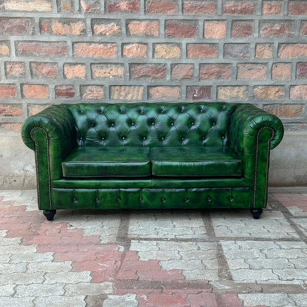 Dark Green Couch added by Megan Cueno
