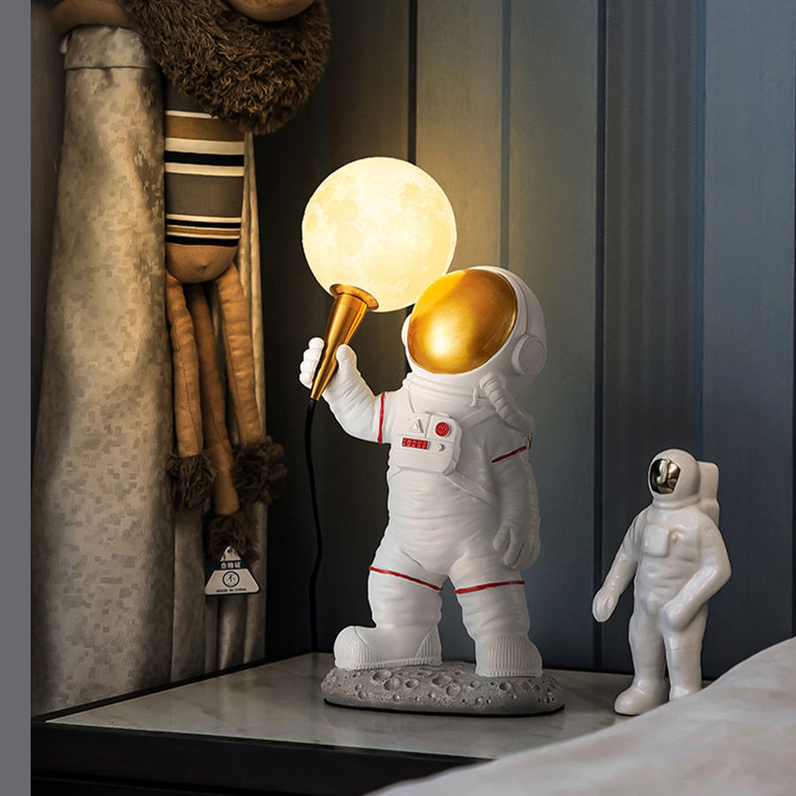 Zoomie Kids Resin Novelty Astronaut Table Lamp With LED Light | Wayfair added by Teila Brown
