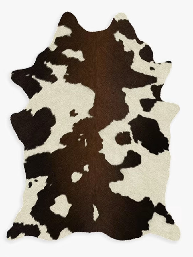 Brown & Black Faux Cowhide Rug added by lydia taylor