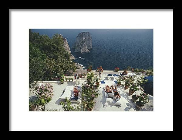 Il Canille Framed Print by Slim Aarons added by Parker Home + Design