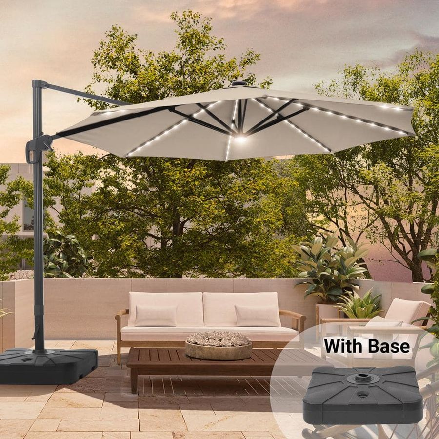 Sonkuki 11 ft. Round Solar LED Aluminum 360-Degree Rotation Cantilever Offset Outdoor Patio Umbrella with a Base in Sand R-BRELA-JC42SD - The Home Depot added by Maggie Rousseau