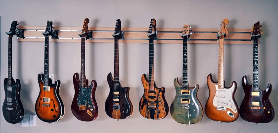 Guitar Hanger MX added by KemptNO LLC