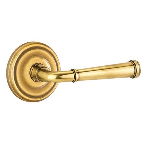 Brass Designer Levers Collection - Passage Right Handed Merrimack Lever With Regular Rose in French Antique Brass by Emtek Hardware added by Alex Grey
