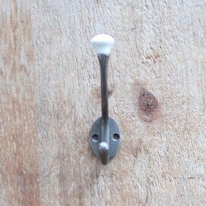 Black cast iron classic vintage design with ceramic hook. added by Serena Finnerty
