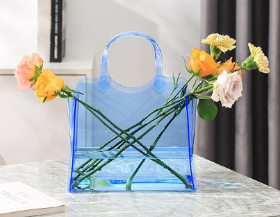 Transparent Navy Blue Vase added by Stephanie Mora