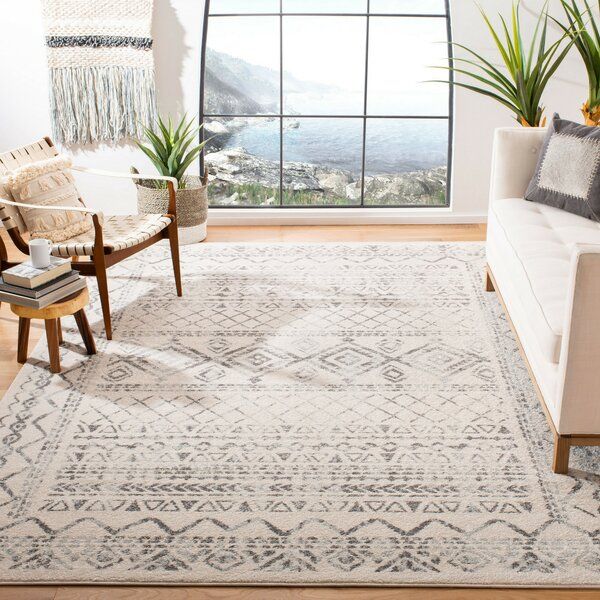 Rentz Southwestern Ivory/Gray Area Rug added by Corissa Bryson