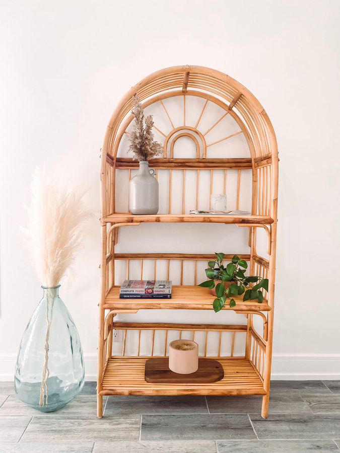 Sunburst rattan bookshelf, rattan bookshelf, wicker bookshelf, rattan shelf added by Taylor Stelter