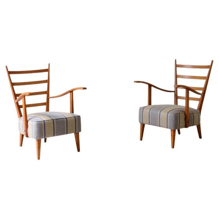 Guglielmo Pecorini's pair of shaped cherry wood armchairs added by Kelley McNutt