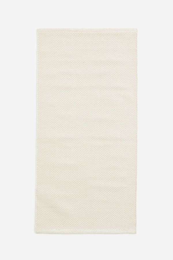 Cotton rug added by scarlett holman