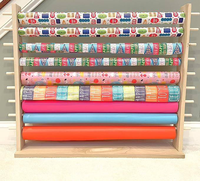 Desktop Station for the Storage and Dispensing of Gift Wrapping Paper, Ribbons, Cellophane, Vinyl Rolls, Paper, Maps Etc. Holds 9 Rows. Designed for 30” rolls. added by Jessica Koczwara