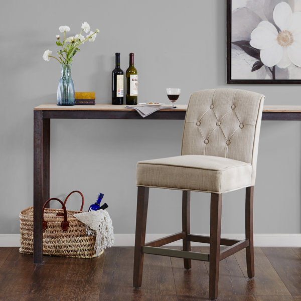 Cayman Button Tufted Counter Stool added by Ericka Mills