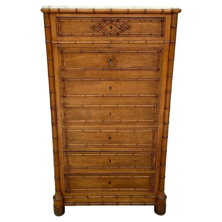 Faux Bamboo Chest Of Drawers With Desk and Marble Top added by Karli Wessale