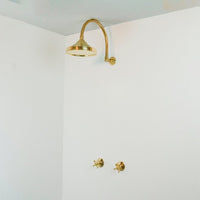 Handcrafted unlacquered brass shower system added by sarah spagnola