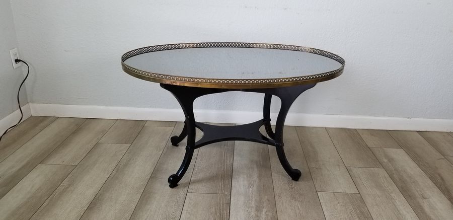 Brass and Mirrored Glass Tray-Top Coffee Table Attributed to Baker Furniture. added by Paige Del