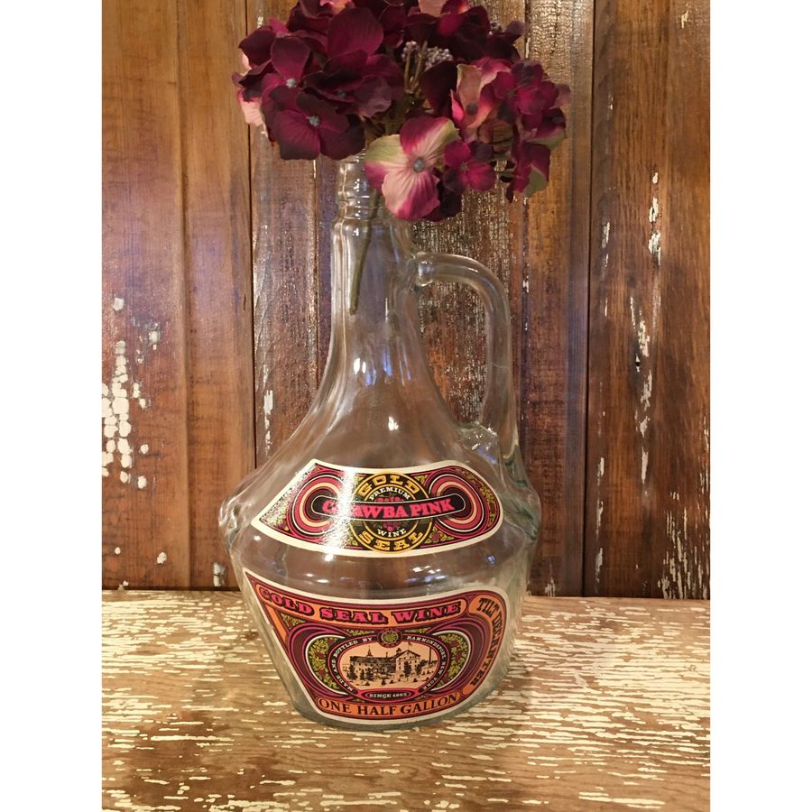 One half gallon clear glass bottle,large jar,Catawba Pink funky wine jug,flower vase,storage,decor,fireplace decor,wine bottle,11" tall added by Spoak Member
